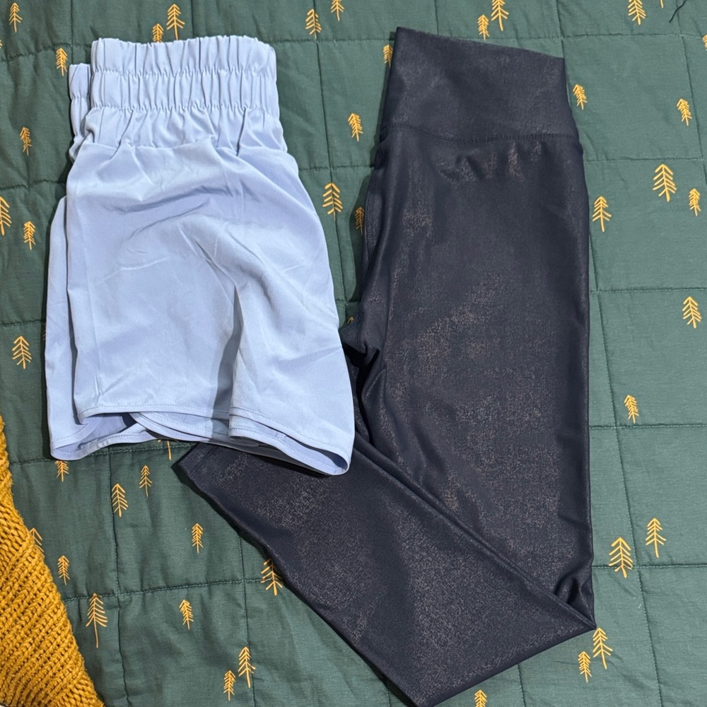 Bundle of blue shorts and shimmery navy leggings